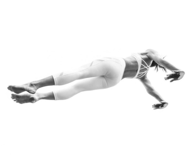 Houser Shoots Yoga Through Glass Box