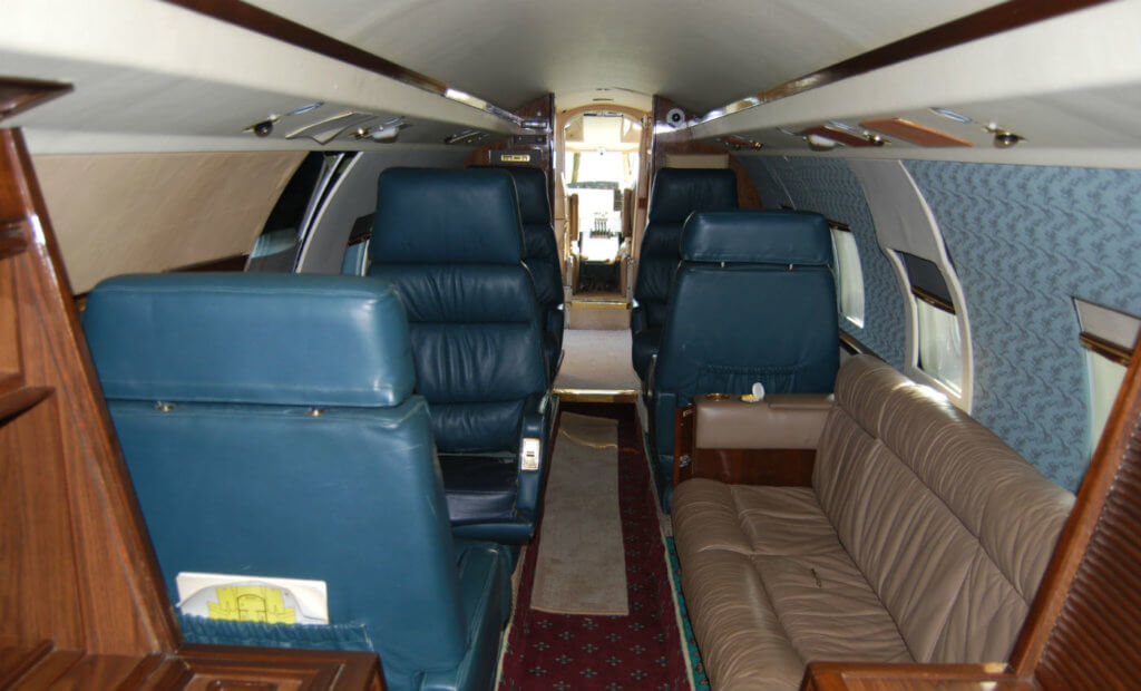 The interior of the business jet simulator is finished as a private jet.