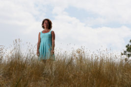 Heather Dearman, cousin of Aurora theater shooting victim Ashley Moser and also vice chair of 7/20 Memorial Foundation, poses for a portrait Sept. 6 at the Aurora Xeriscape Garden.
Photo by Gabriel Christus/Aurora Sentinel