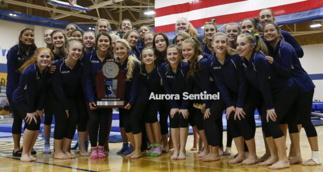 Overland High School gymnastics team takes second in the state on Nov. 3 at Thornton High School. Photo by Michael Ortiz/ Aurora Sentinel