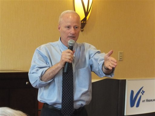 6TH DISTRICT Rep. Mike Coffman explains his votes on health care and federal spending to a group of voters at an assisted-living development in Highlands Ranch, Colo., on Tuesday, July 3, 2012. (AP Photo/Kristen Wyatt)