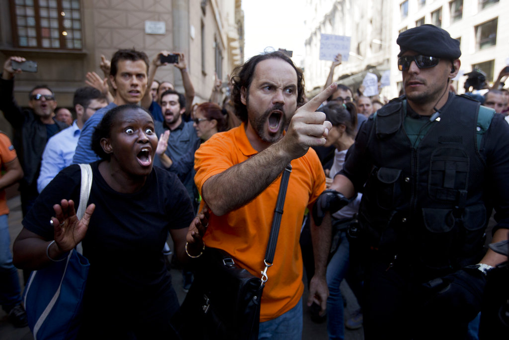 Spanish police arrest Catalan officials over secession vote
