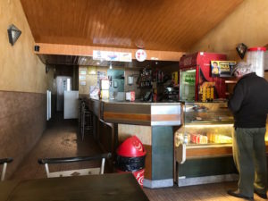 Cafe with cheese and ham sandwiches and lots of cold water.