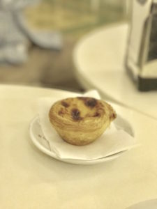 Pastry de Nata is a popular Portuguese treat. It has custard inside a baked crust. Often heated and topped with cinnamon and powdered sugar. Yum!
