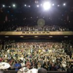 Tony Levin photographs the audience at the Fox Theater