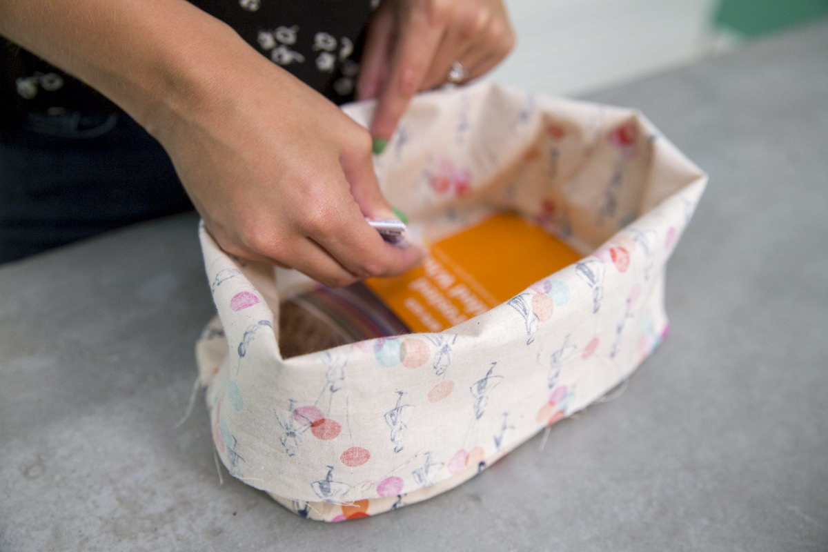 adding items to cardboard lunch box adding items to cardboard lunch box