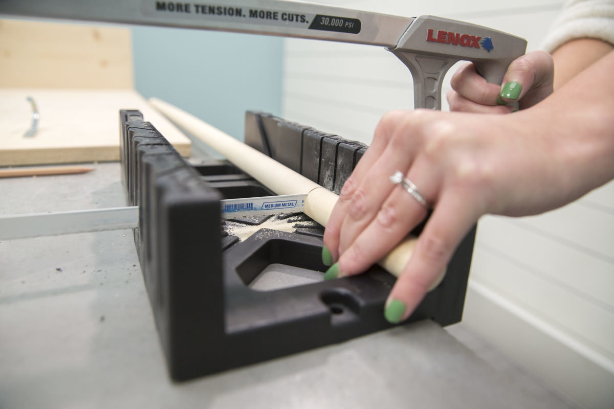 cutting dowel hooks for storage pegboard