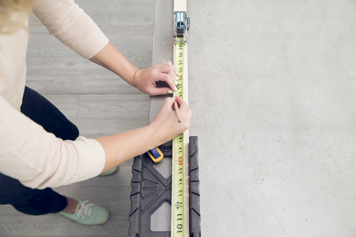 measuring wood for baby gym