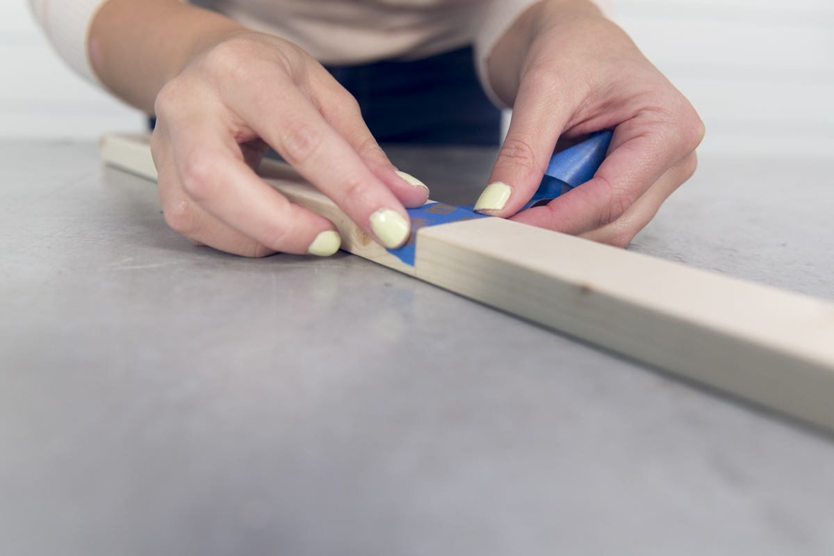 taping wood legs for painting