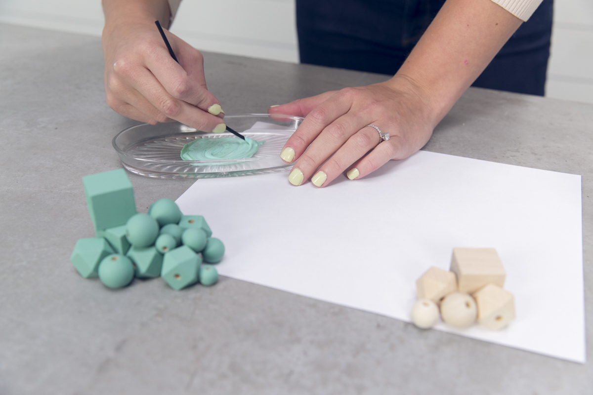 painting turquoise beads