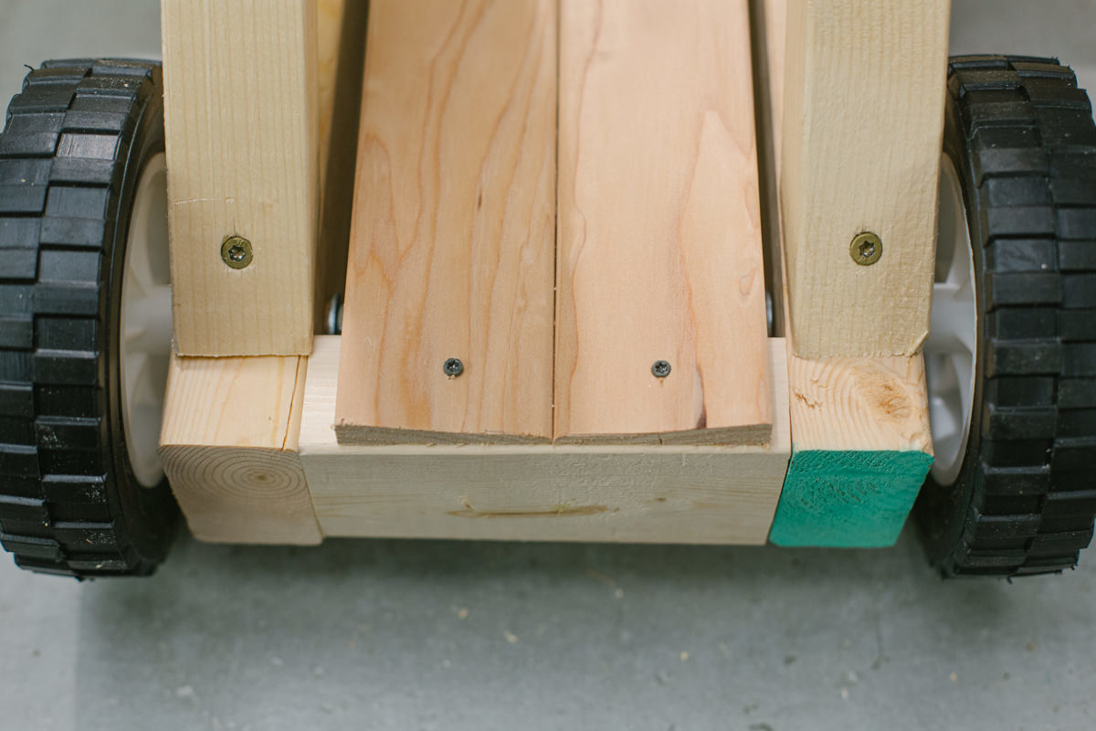 Trebuchet track installed on DIY wooden mini trebuchet assembly.