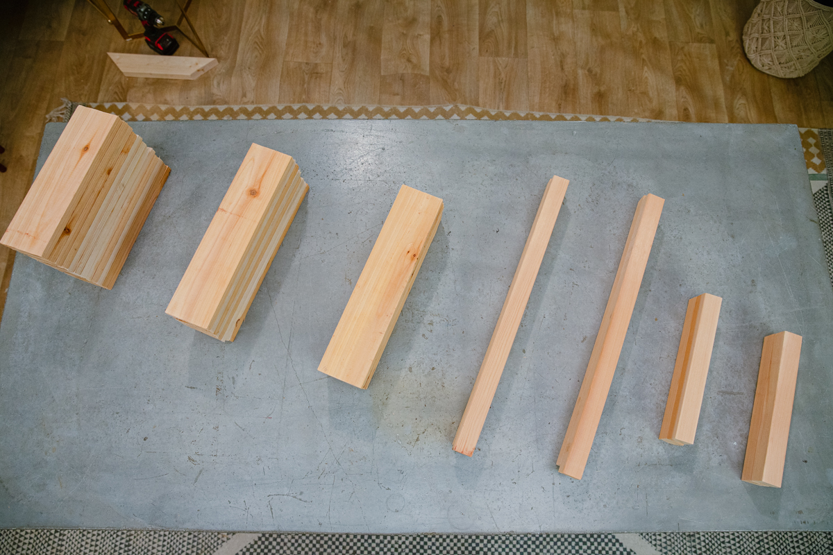 Piles of different sizes of cut boards.