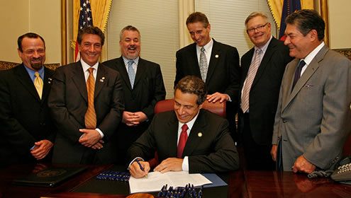 Governor Andrew Cuomo signs the freedom to marry into law, June 2011
