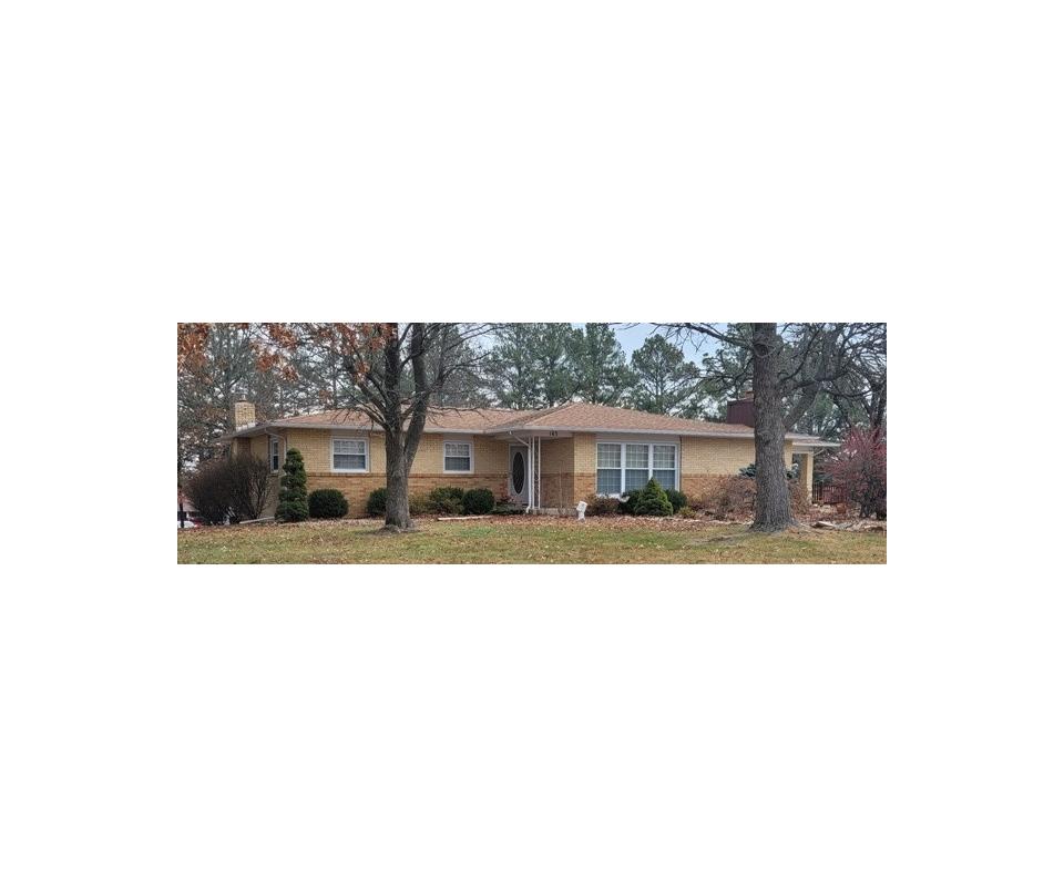 Brick home on 1.5 acres in town