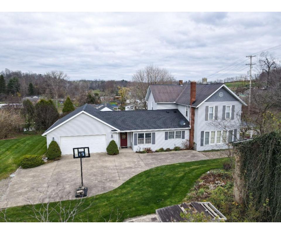 Large Two Story Home on 3 Lots in the Village of Benton