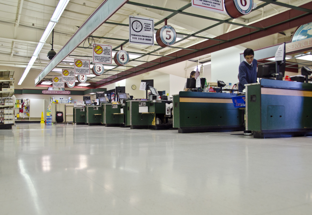 Two checkers ring up orders for customers at A&P on Aug. 31
