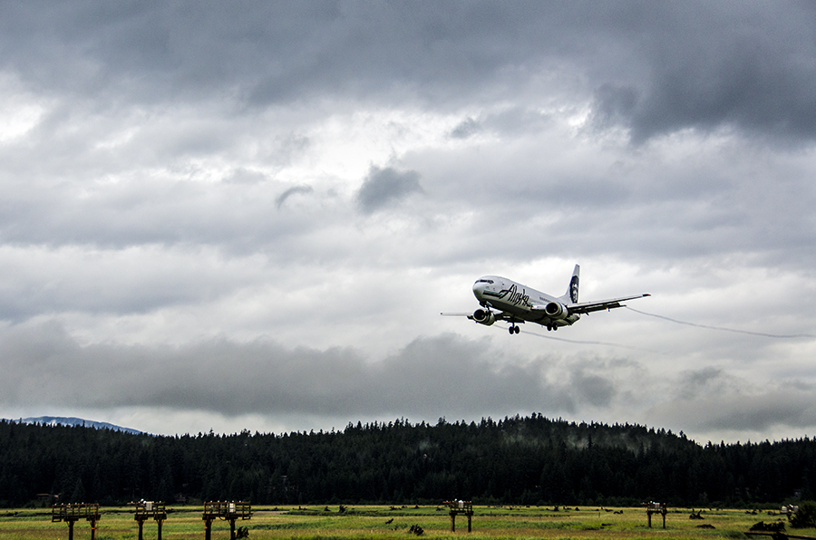 An Alaska Airlines flight comes in for a landing at the Juneau International Airport. An Alaska Airlines flight comes in for a landing at the Juneau International Airport.