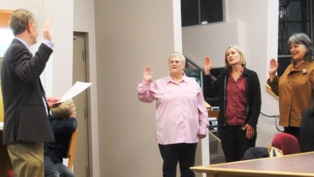 School board sworn in Superior Court Judge Phillip Pallenberg administers oath of office to newly elected Juneau School Board members Destiny Sargeant, Andi Story and Phyllis Carlson.