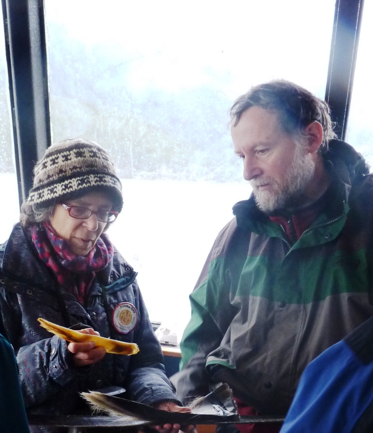 11-3-12 Jan Straley shows baleen to passenger on WhaleFest cruise - compressed Humpback researcher Jan Straley shows whale baleen to a passenger during a Nov. 3 whale-watching tour in Sitka Sound.