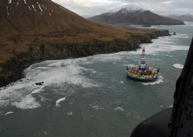 Two life rafts sit on the beach adjacent to Royal Dutch Shell's conical drilling unit Kulluk, 40 miles southwest of Kodiak City, Alaska, Jan. 3, 2013. The Kulluk was grounded after efforts by U.S. Coast Guard and tug vessel crews to move the vessel to a safe harbor during a winter storm during a tow from Dutch Harbor, Alaska, to Everett, Wash. (DoD photo by Petty Officer 2nd Class Zachary Painter, U.S. Coast Guard/Released) Two life rafts sit on the beach adjacent to Royal Dutch Shell's conical drilling unit Kulluk, 40 miles southwest of Kodiak City, Alaska, Jan. 3, 2013. The Kulluk was grounded after efforts by U.S. Coast Guard and tug vessel crews to move the vessel to a safe harbor during a winter storm during a tow from Dutch Harbor, Alaska, to Everett, Wash. (DoD photo by Petty Officer 2nd Class Zachary Painter, U.S. Coast Guard/Released)