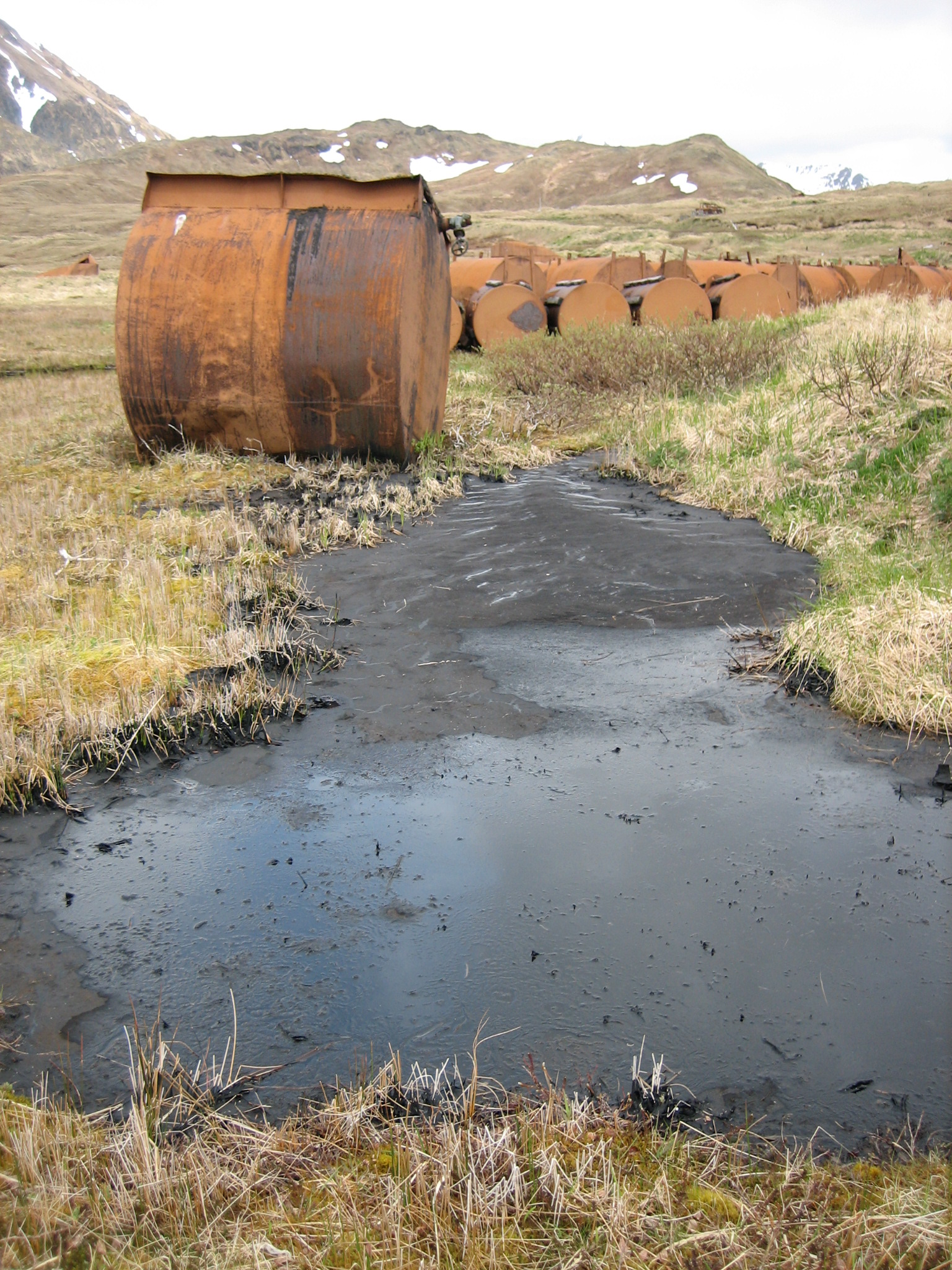 Attu - Fuel tank basin single tank spill 1 A fuel tank spill.