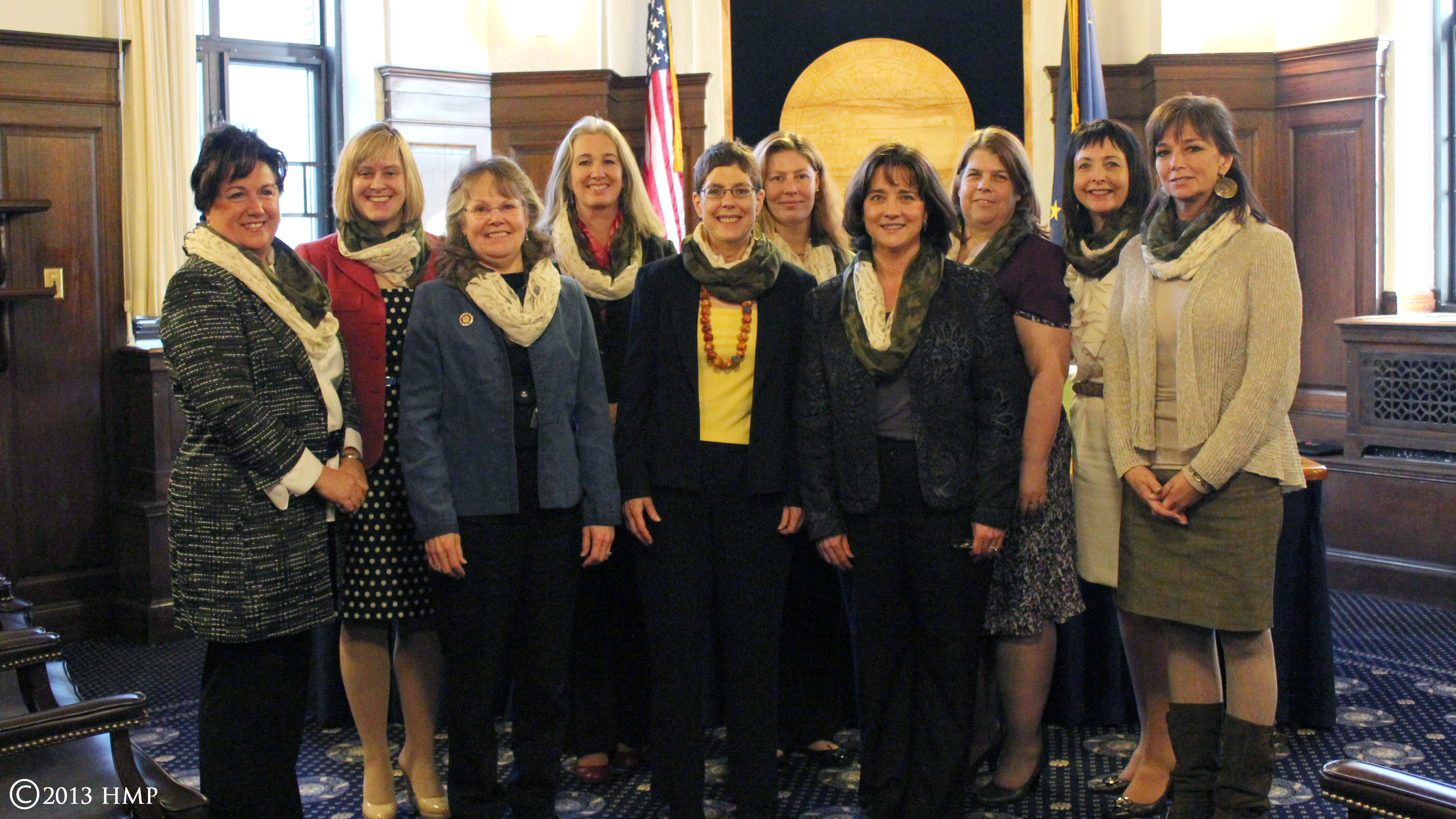 House Majority-scarves The women members of the Alaska House Majority Caucus don special camouflage scarves in support of a pair of gun rights bills on Monday’s House floor calendar. (House Majority Press handout)