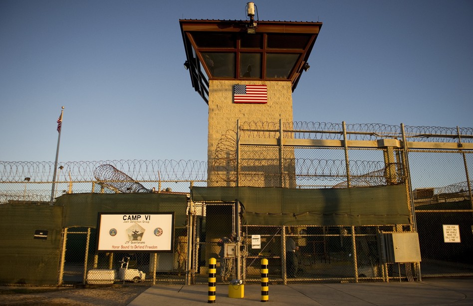 Image 137337237_custom-8c4ccd38315459cda593d60e9c4133c342e67e1a-s6.jpg This image reviewed by the U.S. military shows the front gate of "Camp Six" detention facility of the Joint Detention Group at the US Naval Station in Guantanamo Bay, Cuba. Jim Watson/AFP/Getty Images