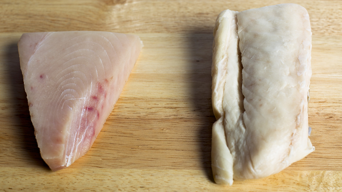 fish-dna Escolar, right, is often substituted for more expensive Albacore tuna (left), a report on mislabeled seafood found. Yoon S. Byun/Boston Globe via Getty Images