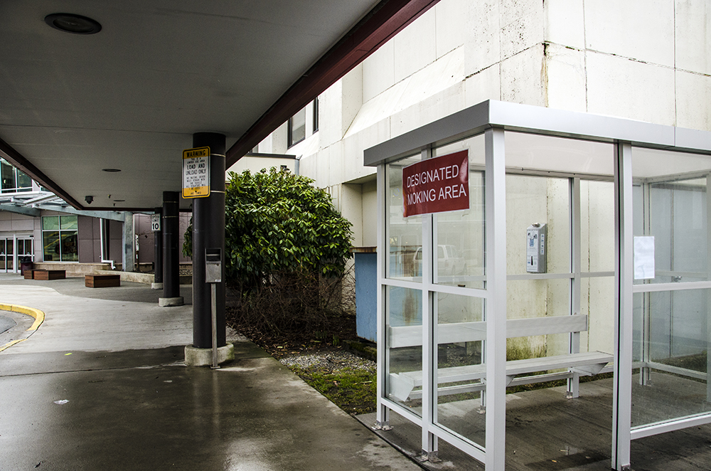 The airport has installed two smoking areas farther from the entrances. The airport has installed two smoking areas farther from the entrances.