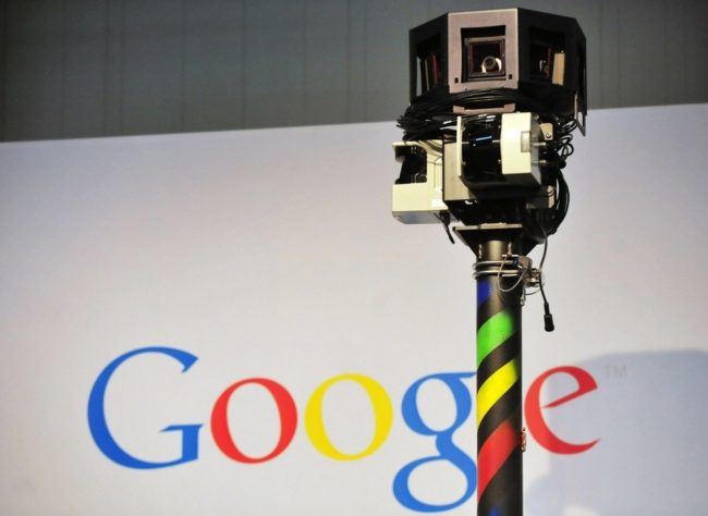 Google-cam The camera mounted on a Google Street View car used to photograph whole streets obscures part of the U.S. Internet giant's logo. Daniel Mihailescu/AFP/Getty Images