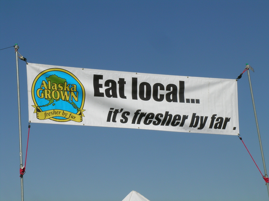 Alaska Grown banner at a farmer's market Alaska Grown banner at a farmer's market