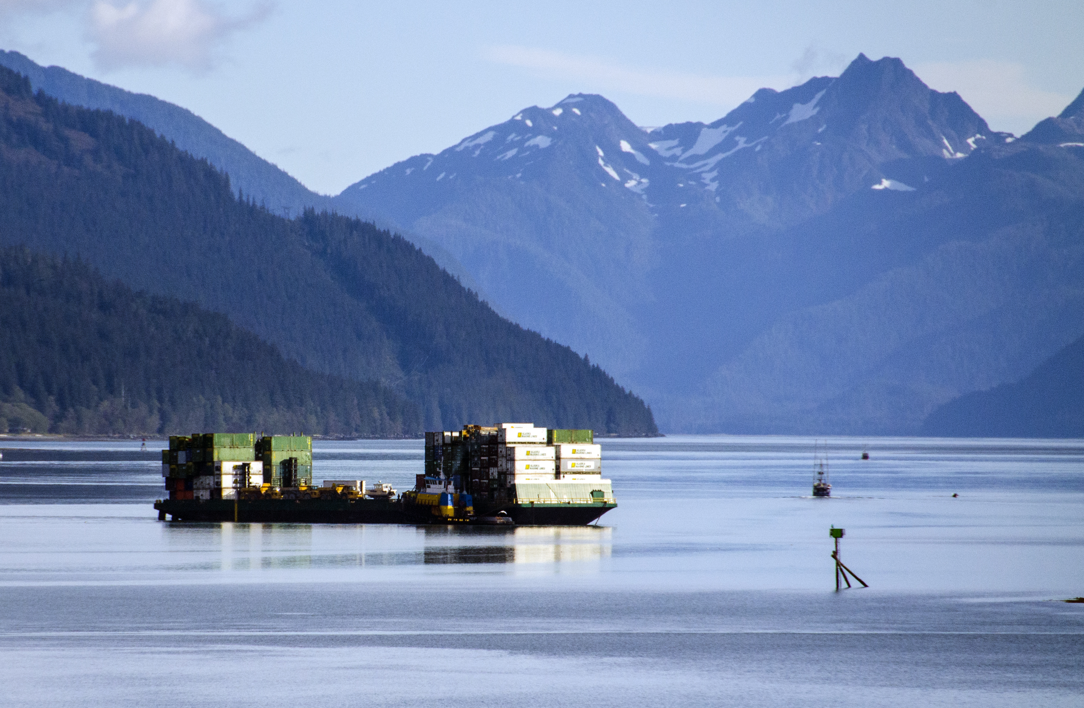 A barge departs from the Alaska Marine Lines dock in downtown Juneau. A barge departs from the Alaska Marine Lines dock in downtown Juneau.