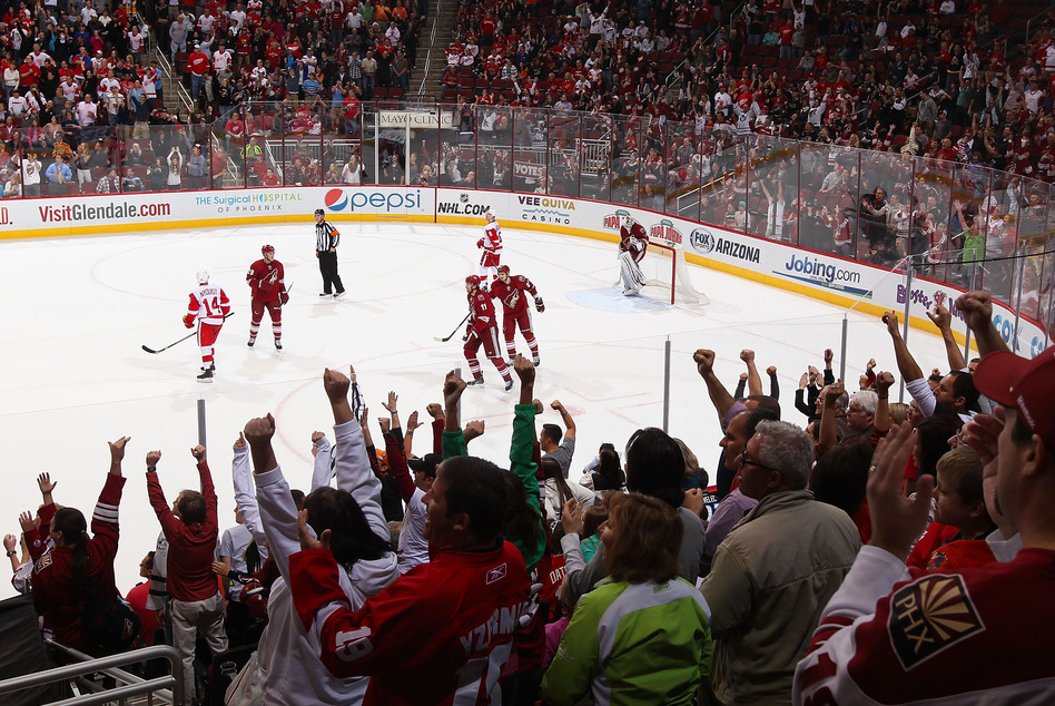 Fans cheer after Martin Hanzal of the Phoenix Coyotes scores an empty-net goal against the Detroit Red Wings in Glendale, Ariz., on April 4. Christian Petersen/Getty Images Fans cheer after Martin Hanzal of the Phoenix Coyotes scores an empty-net goal against the Detroit Red Wings in Glendale, Ariz., on April 4. Christian Petersen/Getty Images