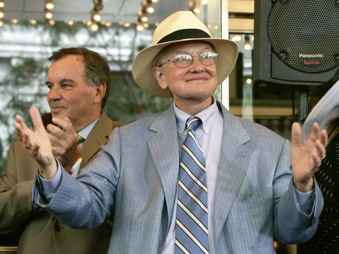 Film critic Roger Ebert acknowleges the applause of those gathered to pay tribute to him at the historic Chicago Theatre on July 18, 2005. Charles Rex Arbogast/AP Film critic Roger Ebert acknowleges the applause of those gathered to pay tribute to him at the historic Chicago Theatre on July 18, 2005. Charles Rex Arbogast/AP