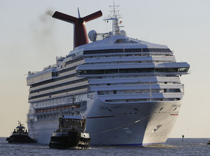The cruise ship Carnival Triumph, seen here as it arrived in Mobile, Ala., in February, has now disembarked for the Bahamas. The powerless ship was towed to port with 3,143 passengers aboard in February. The cruise ship Carnival Triumph, seen here as it arrived in Mobile, Ala., in February, has now disembarked for the Bahamas. The powerless ship was towed to port with 3,143 passengers aboard in February.