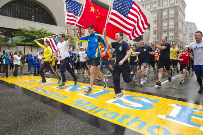 Runners holding American flags and a Chinese flag cross the finish line after completing the final mile of the Boston Marathon course during "#onerun" in Boston, Massachusetts on Saturday. Dominick Reuter /Reuters /Landov Runners holding American flags and a Chinese flag cross the finish line after completing the final mile of the Boston Marathon course during "#onerun" in Boston, Massachusetts on Saturday. Dominick Reuter /Reuters /Landov