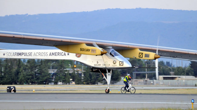 The Solar Impulse takes off from Moffett Field NASA Ames Research Center in Mountain View, Calif., Friday, as a team member rides an electric bike alongside the plane. AFP/AFP/Getty Images The Solar Impulse takes off from Moffett Field NASA Ames Research Center in Mountain View, Calif., Friday, as a team member rides an electric bike alongside the plane. AFP/AFP/Getty Images