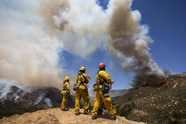 Firefighters keep watch at Green Valley as the fire has burned more than 1,400 acres since Thursday in the Angeles National Forest just north of Castaic, in California. Zhao Hanrong /Xinhua /Landov Firefighters keep watch at Green Valley as the fire has burned more than 1,400 acres since Thursday in the Angeles National Forest just north of Castaic, in California. Zhao Hanrong /Xinhua /Landov