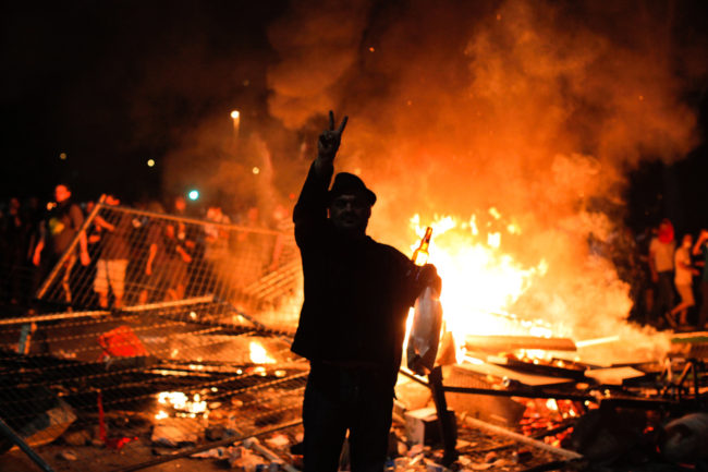 Protesters clash with riot police between Taksim and Besiktas in Istanbul, on Sunday. Gurcan Ozturk/AFP/Getty Images Protesters clash with riot police between Taksim and Besiktas in Istanbul, on Sunday. Gurcan Ozturk/AFP/Getty Images
