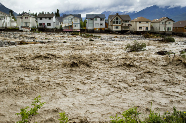 Houses damaged along the edge of Cougar Creek in Canmore, Canada. Widespread flooding caused by torrential rains washed out bridges and roads prompting the evacuation of thousands on Thursday. John Gibson/Getty Images Houses damaged along the edge of Cougar Creek in Canmore, Canada. Widespread flooding caused by torrential rains washed out bridges and roads prompting the evacuation of thousands on Thursday. John Gibson/Getty Images