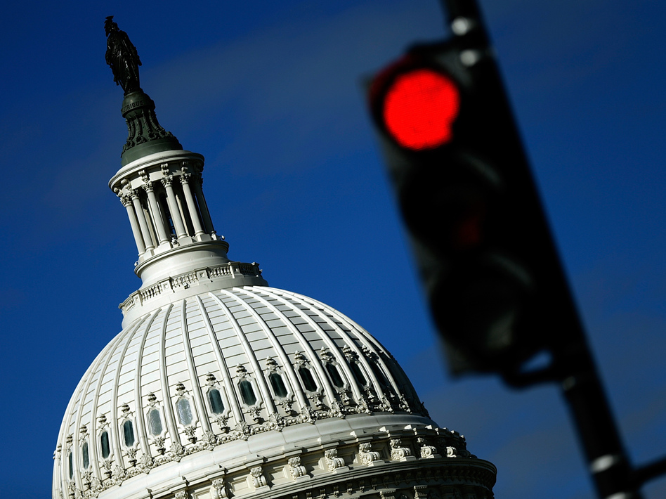 Inside the Capitol, lawmakers are battling over health care and the budget. Outside, many government services may come to a stop at midnight. Win McNamee/Getty Images Inside the Capitol, lawmakers are battling over health care and the budget. Outside, many government services may come to a stop at midnight. Win McNamee/Getty Images