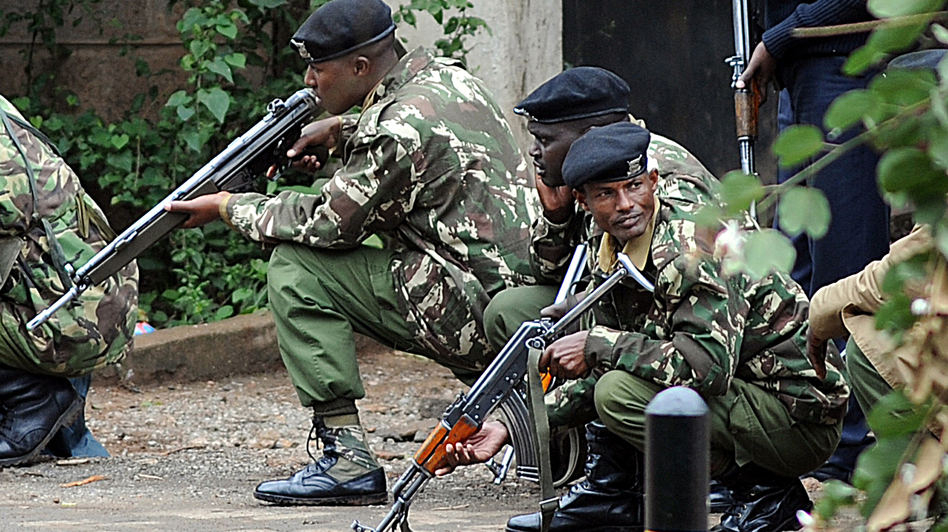 Kenyan police officers take cover outside the Westgate mall in Nairobi on Monday. Simon Maina /AFP/Getty Images Kenyan police officers take cover outside the Westgate mall in Nairobi on Monday. Simon Maina /AFP/Getty Images