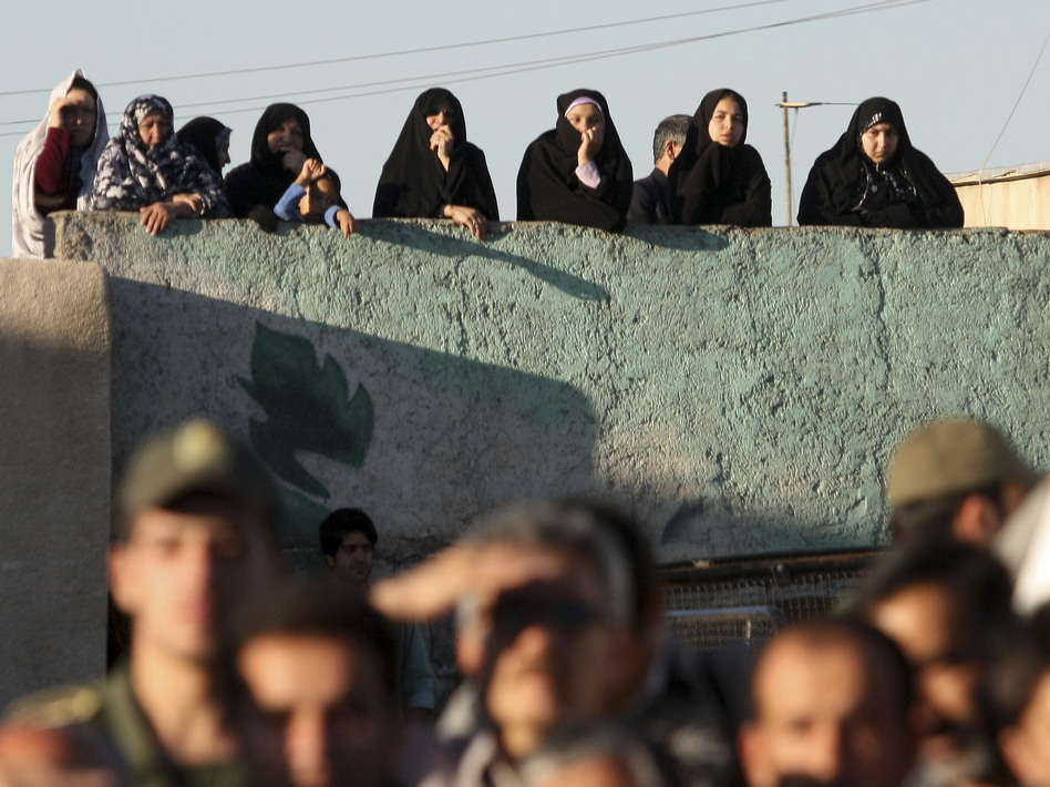 Iranians watch the hanging of a convicted man at the city of Qazvin, northwest of the capital Tehran, in May 2011. Hamideh Shafieeha/AP Iranians watch the hanging of a convicted man at the city of Qazvin, northwest of the capital Tehran, in May 2011. Hamideh Shafieeha/AP