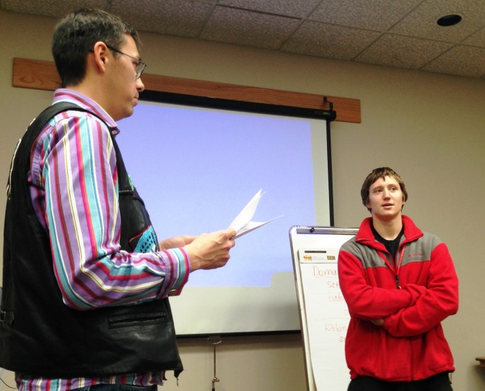 11-8-13 Tlingit Spelling Bee Hans Chester gives winner Will Geiger a word