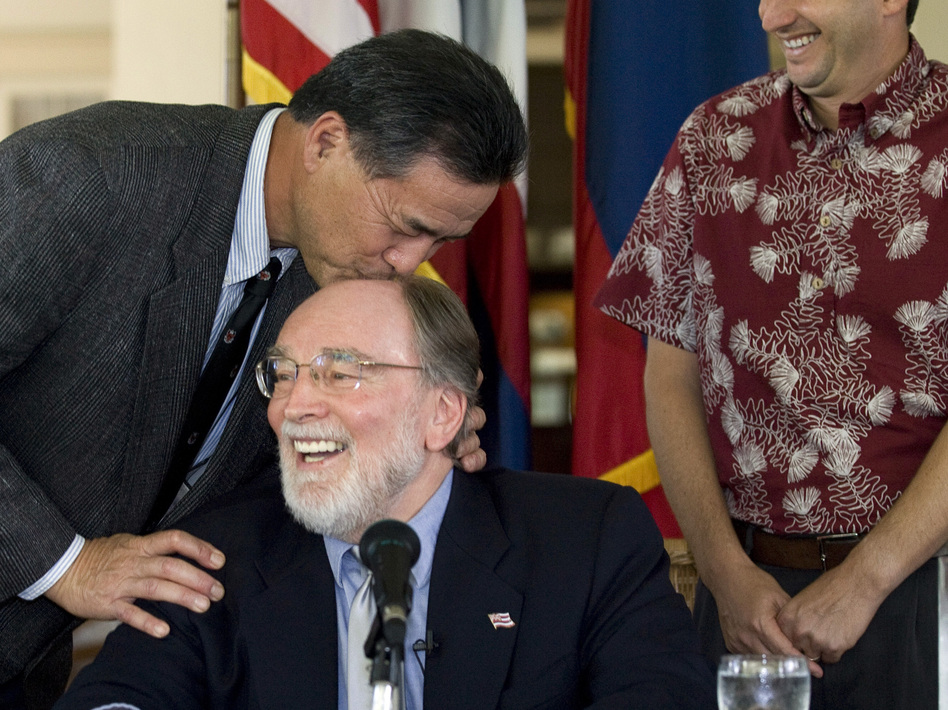 Hawaii state Sen. Clayton Hee playfully gives Gov. Neil Abercrombie a kiss on the head before he signs the Hawaii Civil Unions bill into law at a ceremony in February 2011 in Honolulu. Eugene Tanner/AP Hawaii state Sen. Clayton Hee playfully gives Gov. Neil Abercrombie a kiss on the head before he signs the Hawaii Civil Unions bill into law at a ceremony in February 2011 in Honolulu. Eugene Tanner/AP