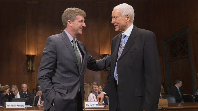 Former Rep. Patrick Kennedy (left) is welcomed by Sen. Orrin Hatch, R-Utah, during a hearing about mental health parity rules Thursday. A new rule issued by the Obama administration aims to increase parity for how insurers handle mental health issues. Chip Somodevilla/Getty Images Former Rep. Patrick Kennedy (left) is welcomed by Sen. Orrin Hatch, R-Utah, during a hearing about mental health parity rules Thursday. A new rule issued by the Obama administration aims to increase parity for how insurers handle mental health issues. Chip Somodevilla/Getty Images