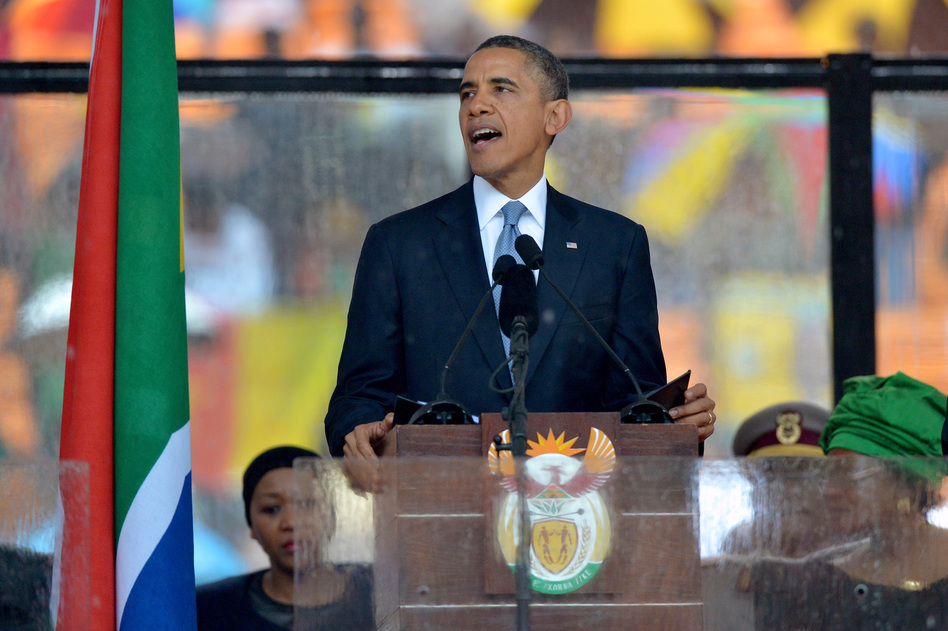 President Obama delivers a speech during the memorial service for late South African President Nelson Mandela at Soccer City Stadium in Johannesburg Tuesday. Alexander Joe /AFP/Getty Images President Obama delivers a speech during the memorial service for late South African President Nelson Mandela at Soccer City Stadium in Johannesburg Tuesday. Alexander Joe /AFP/Getty Images