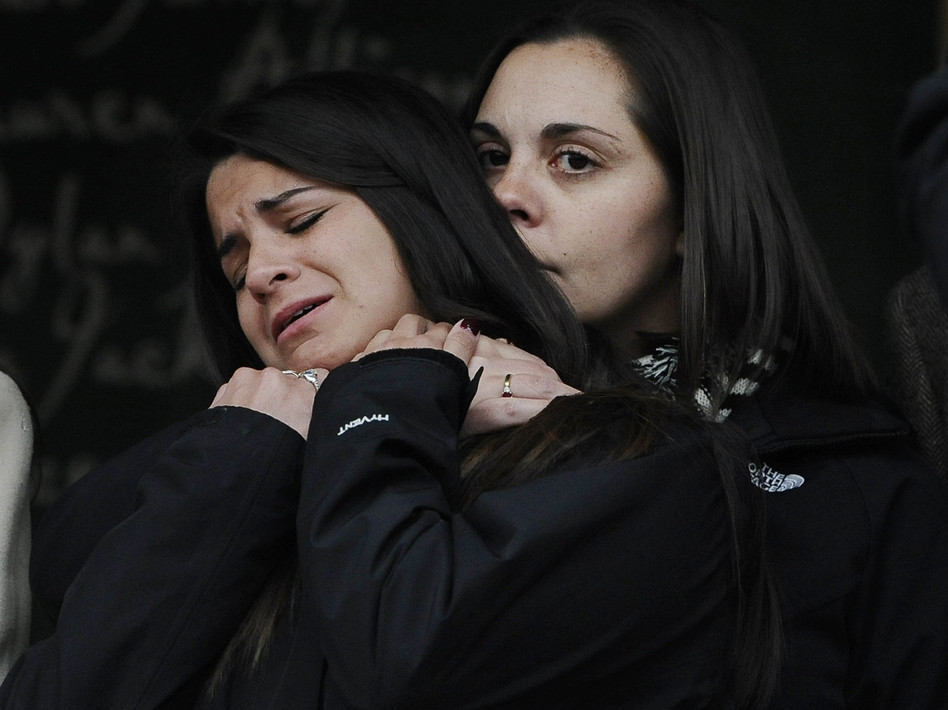Erica Lafferty (right), daughter of Sandy Hook Elementary School shooting victim Dawn Hochsprung, consoles Carlee Soto, sister of victim Victoria Soto, after representatives of 14 families addressed the media on Monday in Newtown, Conn. Jessica Hill/AP Erica Lafferty (right), daughter of Sandy Hook Elementary School shooting victim Dawn Hochsprung, consoles Carlee Soto, sister of victim Victoria Soto, after representatives of 14 families addressed the media on Monday in Newtown, Conn. Jessica Hill/AP