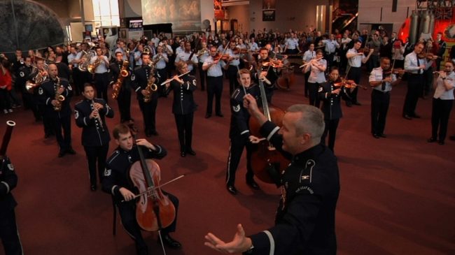 Col. Larry H. Lang conducts the Band's first-ever flash mob at the National Air and Space Museum on Dec. 3. U.S. Air Force Col. Larry H. Lang conducts the Band's first-ever flash mob at the National Air and Space Museum on Dec. 3. U.S. Air Force