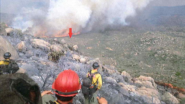 A photo taken by the Granite Mountain Hotshots on June 30 shows their position on a ridge, with a red arrow indicating the original location of their lookout. The crew's lookout was the only team member to survive the fire. Chris MacKenzie/Granite Mountain Hotshots A photo taken by the Granite Mountain Hotshots on June 30 shows their position on a ridge, with a red arrow indicating the original location of their lookout. The crew's lookout was the only team member to survive the fire. Chris MacKenzie/Granite Mountain Hotshots